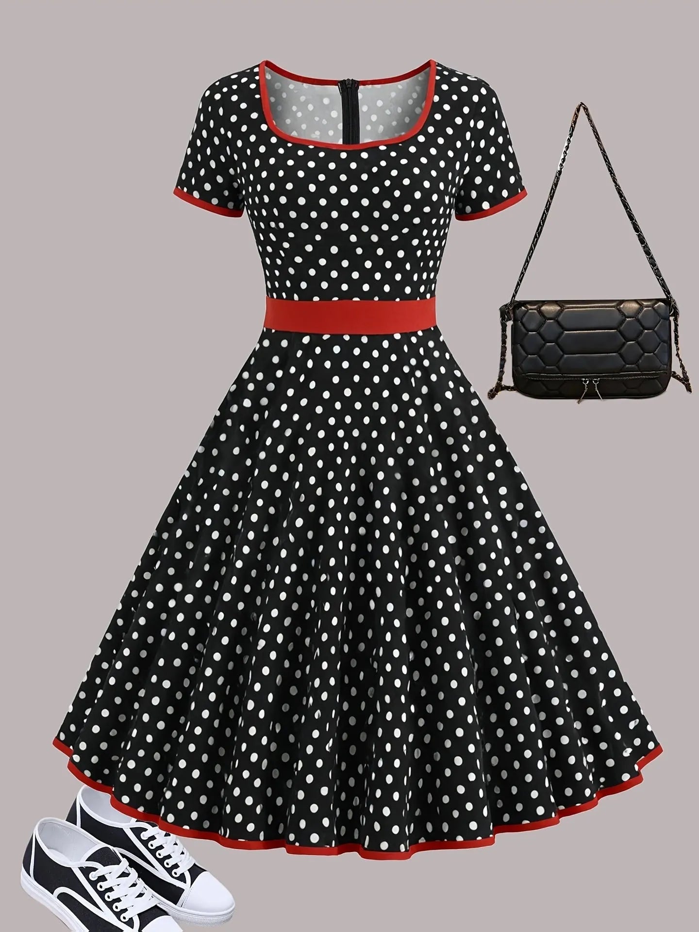 Women's multicolour polka dot dress with a square collar, short sleeves, and a pleated mid-length skirt.