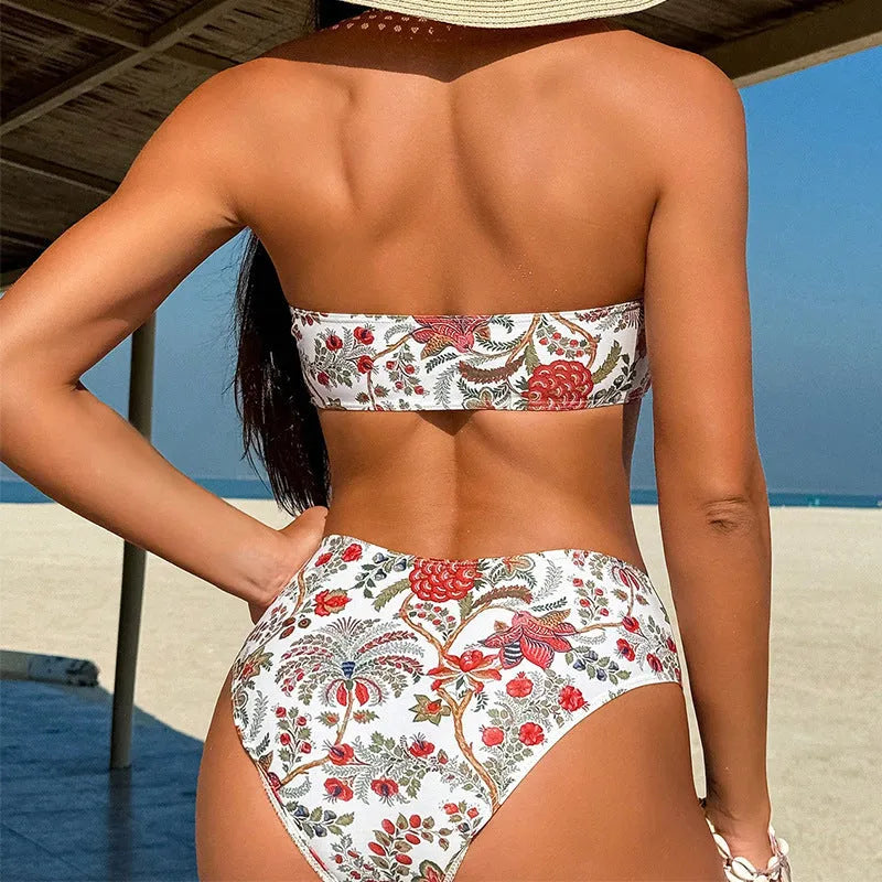 Women's printed bandeau swimsuit top and matching shorts set on a white background.