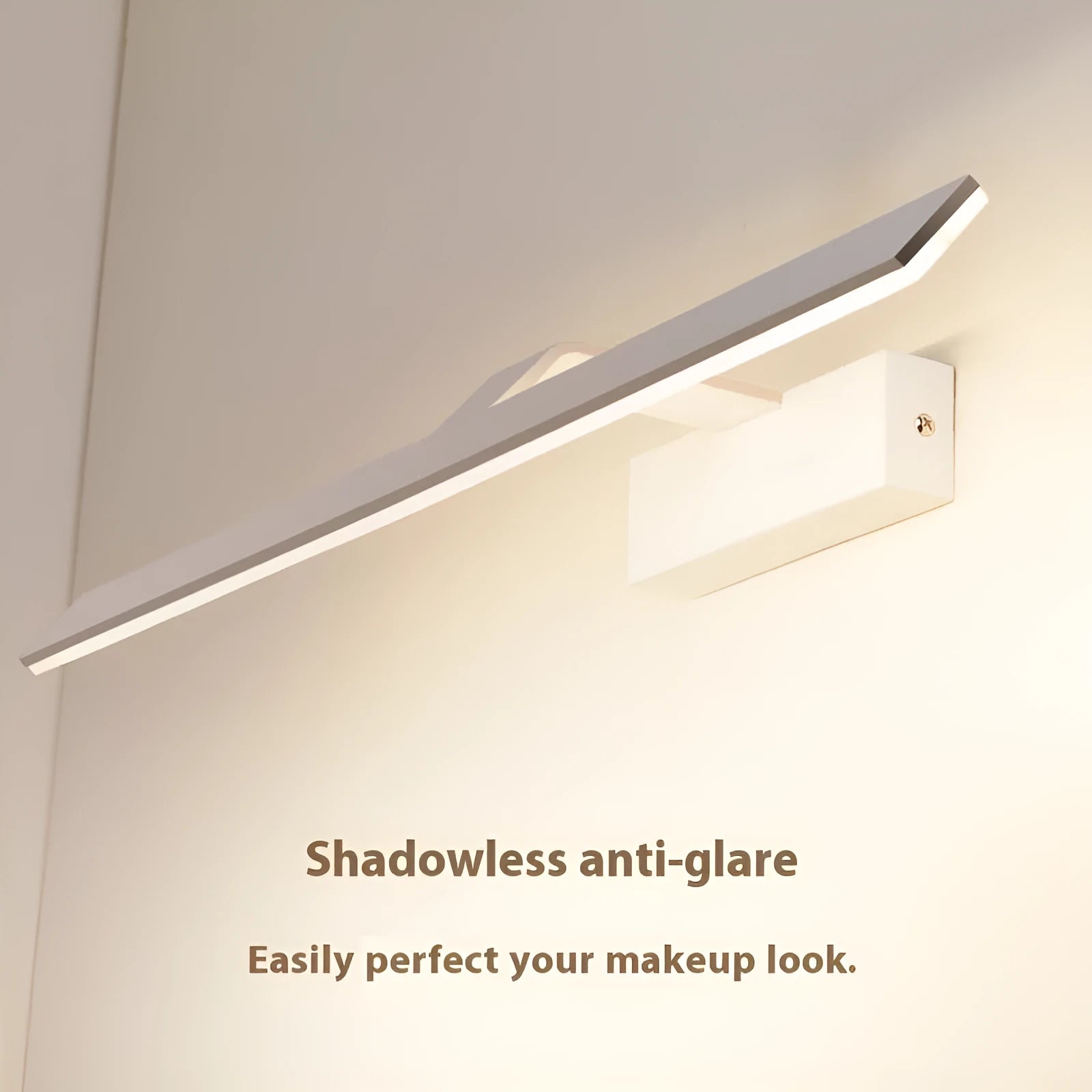 White LED bathroom mirror headlight with tri-colour dimming, shown in 580mm length above a mirror.