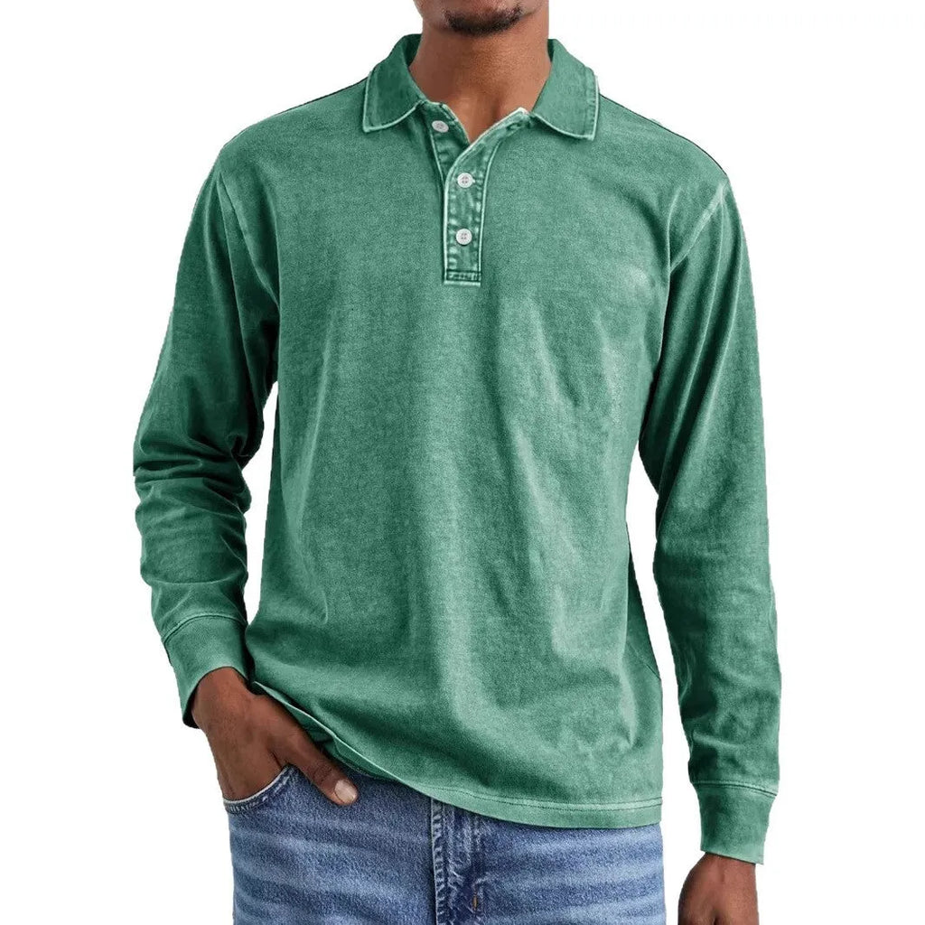 Man wearing a retro washed army green long sleeve polo shirt with a distressed lapel.