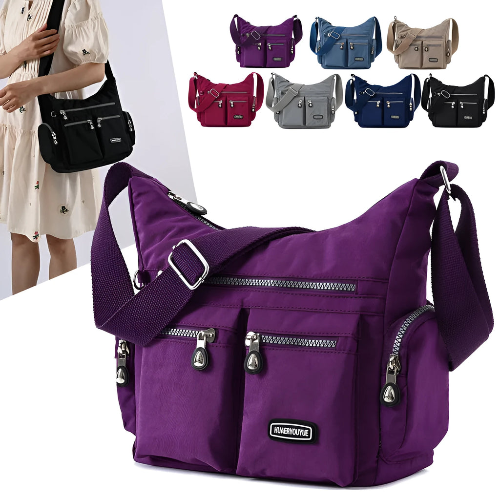 Women's waterproof nylon crossbody shoulder bag in black with multiple pockets and telescopic handle