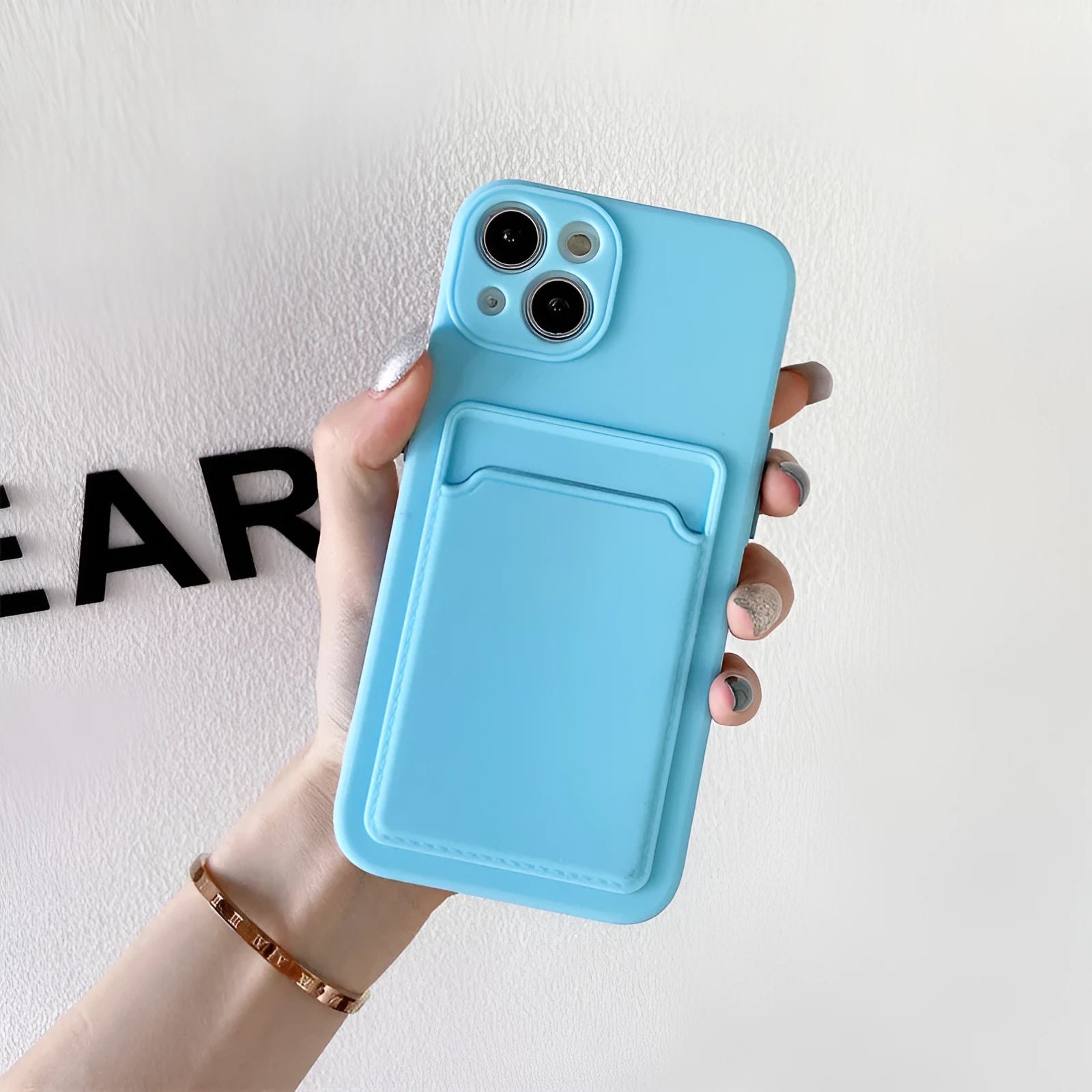 Sky Blue silicone iPhone case with colour blocking design showing card slot on back