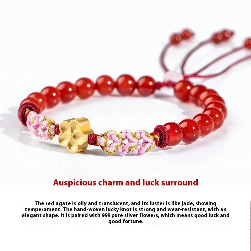 Chinese style women's bracelet with hand-woven red rope and peach blossom crystal charms