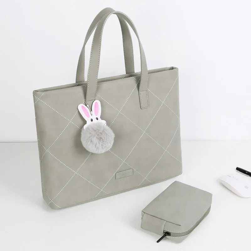 Crossbody genuine leather laptop bag in beige with nylon lining, fits 13 inch laptop