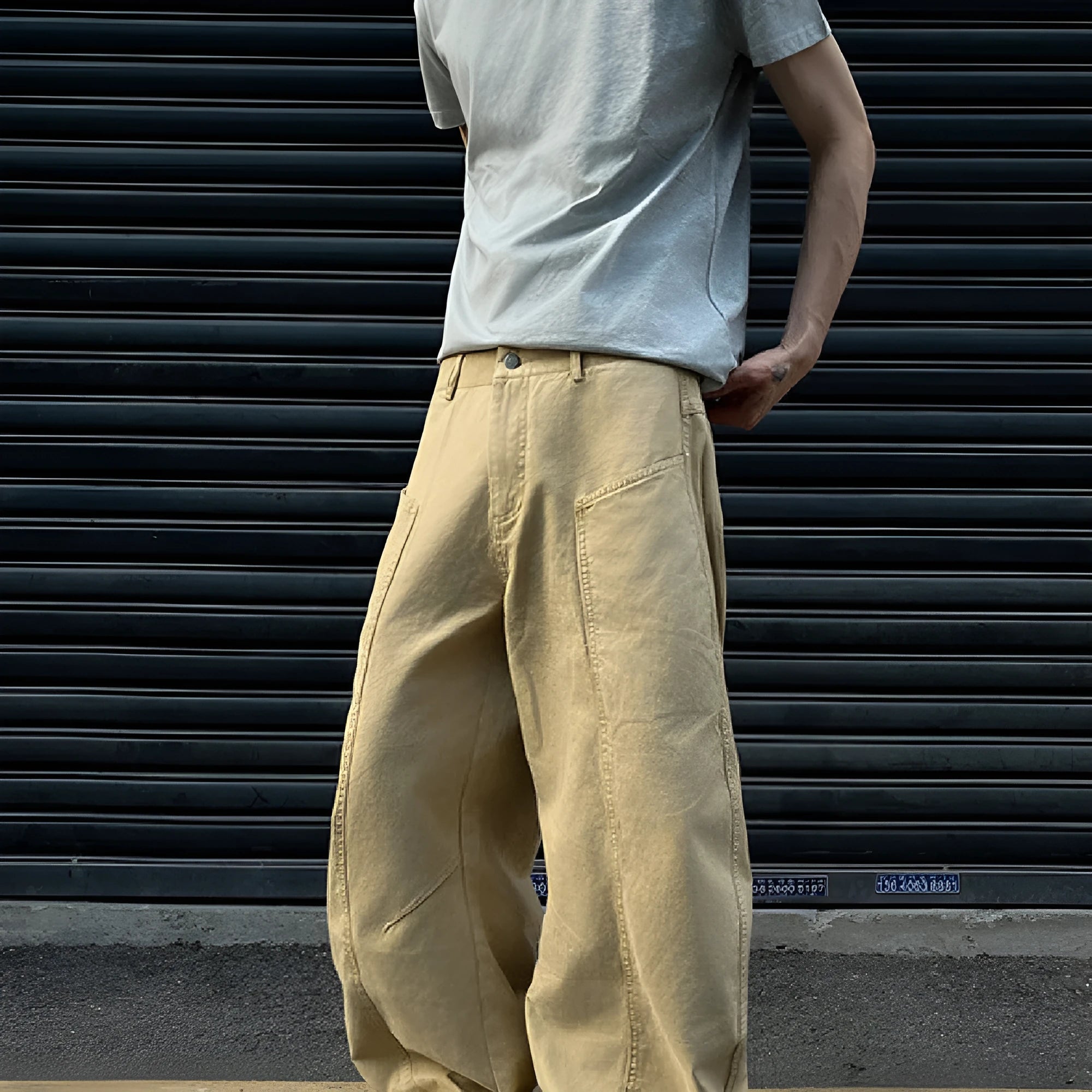 Men's khaki cotton straight-leg trousers laid flat showing American retro casual style