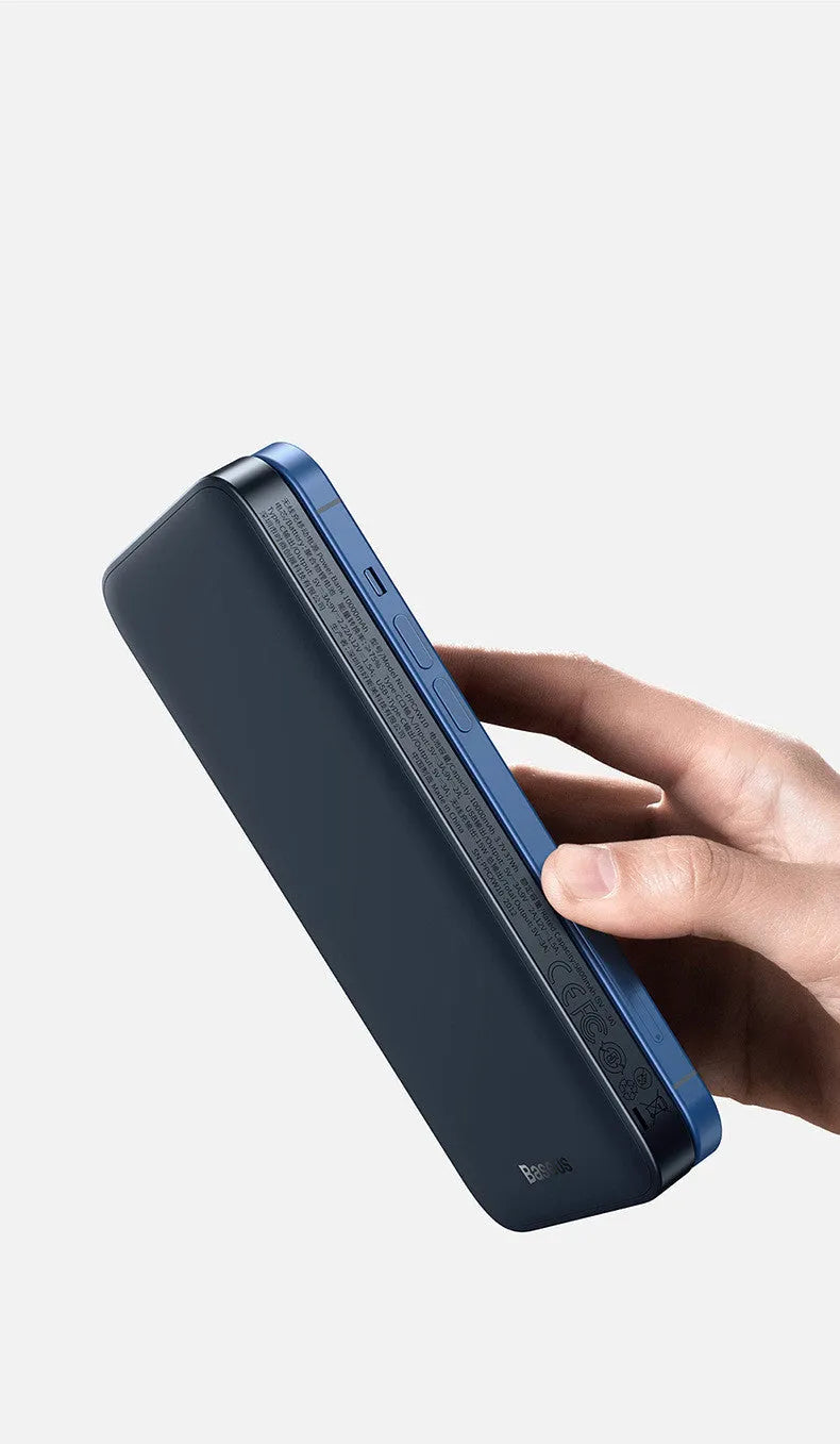 Blue MagSafe magnetic wireless power bank with LCD display showing battery percentage
