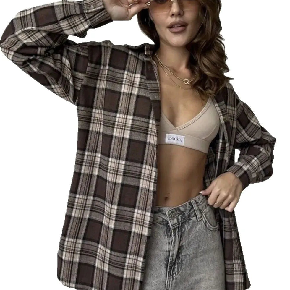 Dark brown striped long sleeve women's shirt with retro style collar on a hanger.
