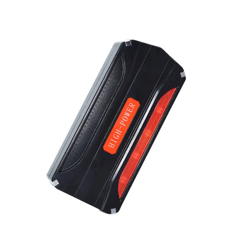 Black and red 12V vehicle emergency jump starter power supply unit with display