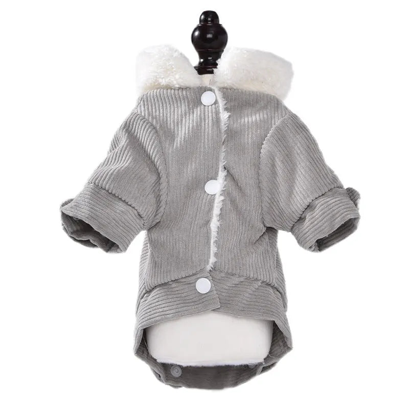 A grey lambswool-lined padded vest for dogs, shown on a mannequin, for winter warmth.