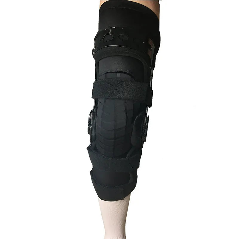Black anterior ligament knee supporter with structural framework on brushed cloth background