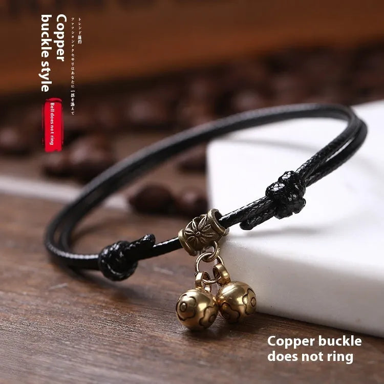 Nylon rope dog collar with brass bell shown in black, red, and coffee colours.