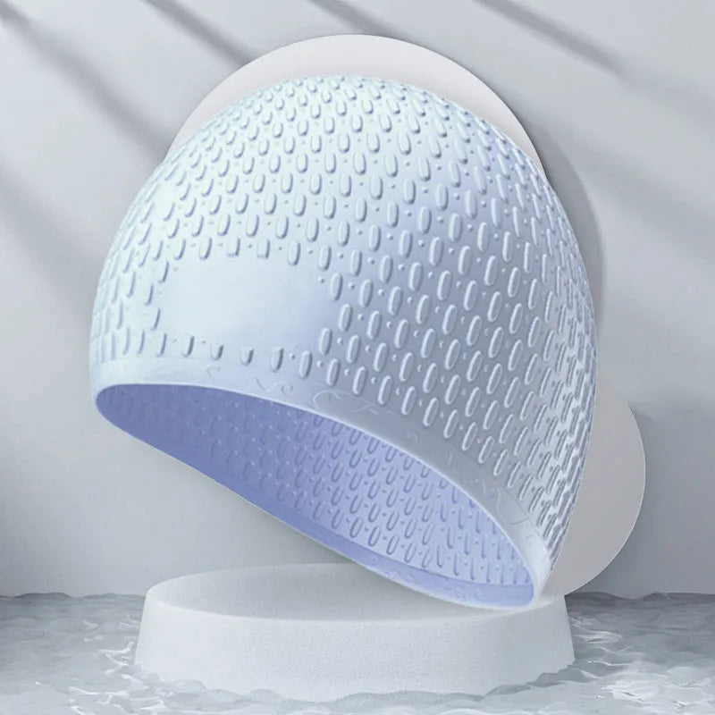 Solid colour silicone swimming cap for adults, shown in one of eight available colours including Tiffany Blue.