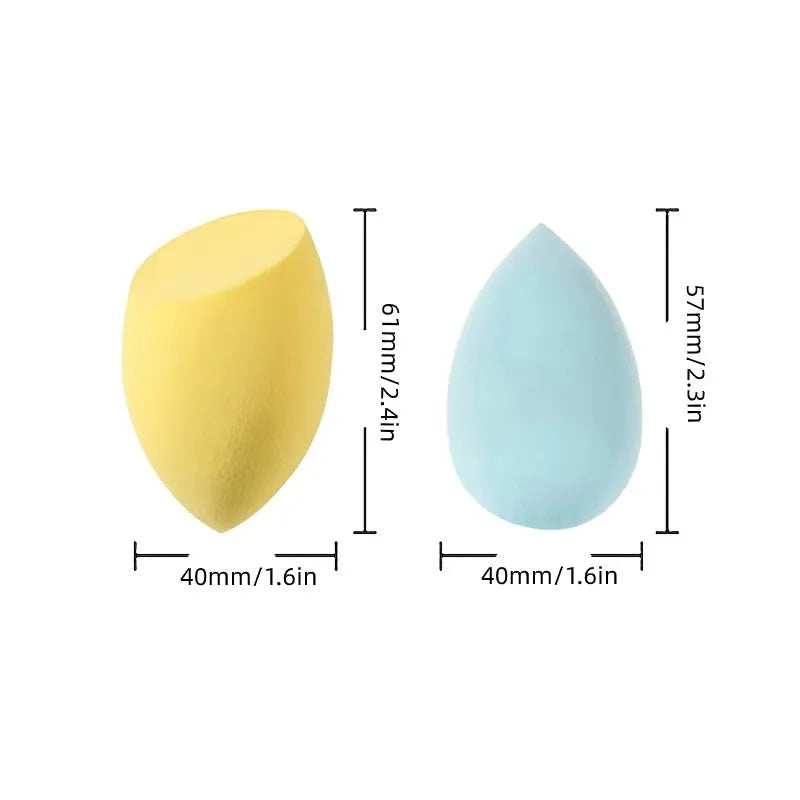 Seven different shaped makeup sponge puffs in various colours including pink, blue and burgundy