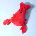 Red squeaky lobster plush dog toy measuring 12.5 cm for small and medium breeds