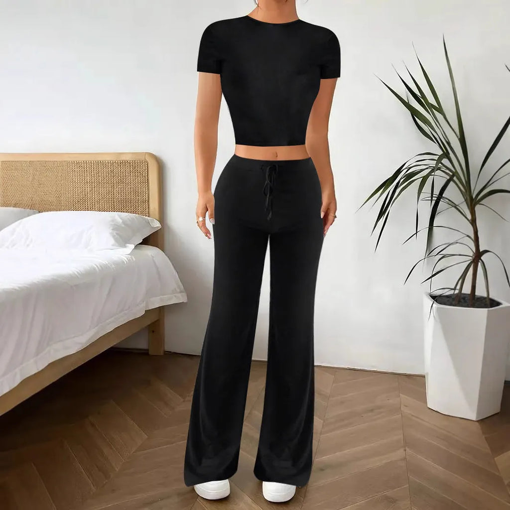 Black high waist trousers and regular sleeve T-shirt co-ordinated suit set.