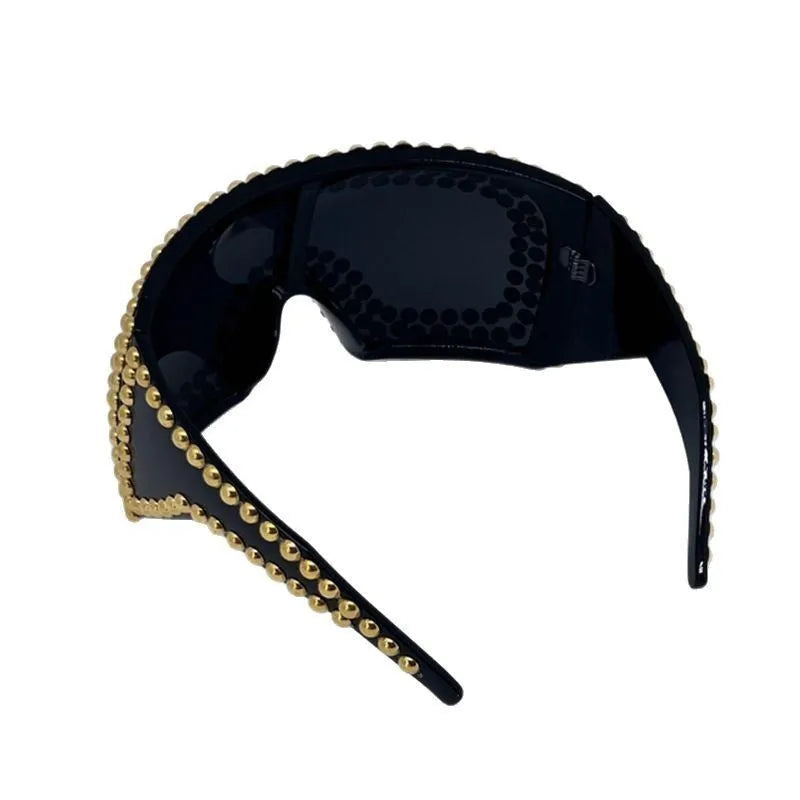 Men's silver punk sunglasses with large square frames and rivet details on the temples