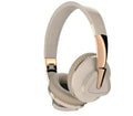Black wireless over-ear Bluetooth headset with all-inclusive ear cups, showing AUX port and control buttons.