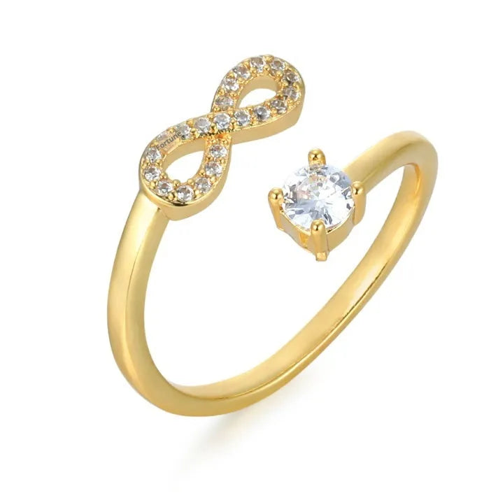 Geometric open ring with a zircon-studded letter 'A' in a rose gold metal finish.