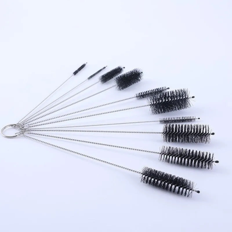 Stainless steel and nylon cleaning brush set showing multiple brushes in a white colour option.
