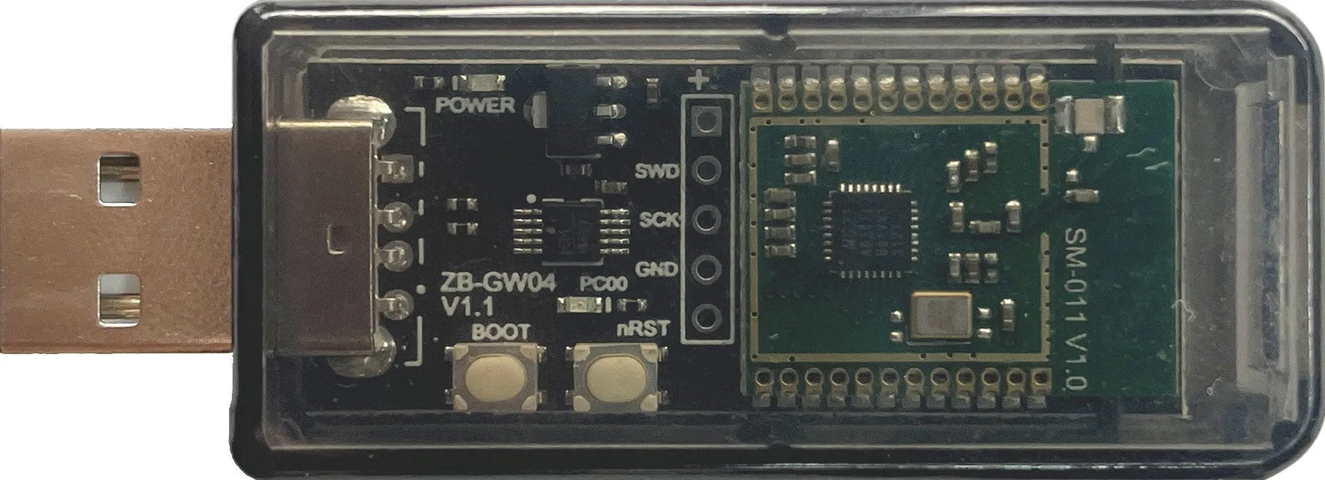 Silicon Labs EFR32MG21 Zigbee USB dongle in a white plastic housing.