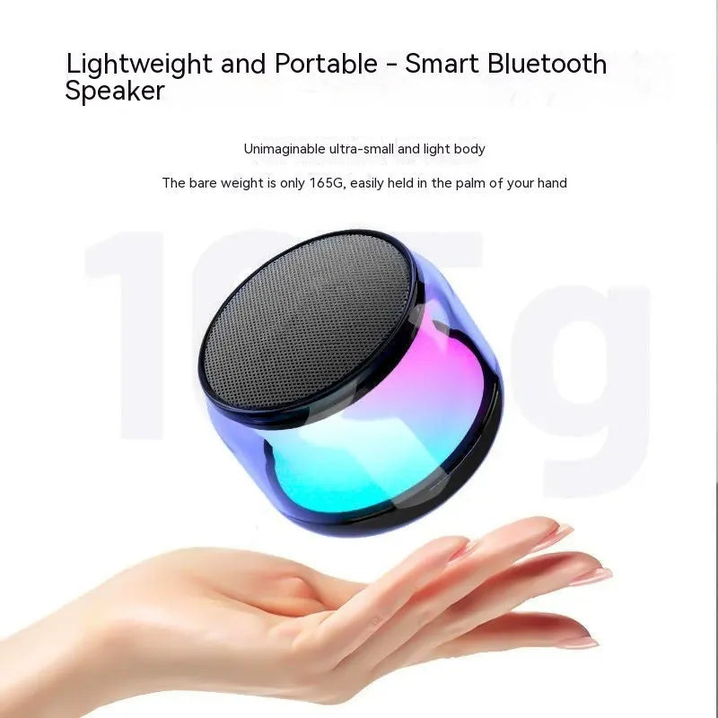 Black gun-shaped Bluetooth speaker with coloured glaze finish on desktop