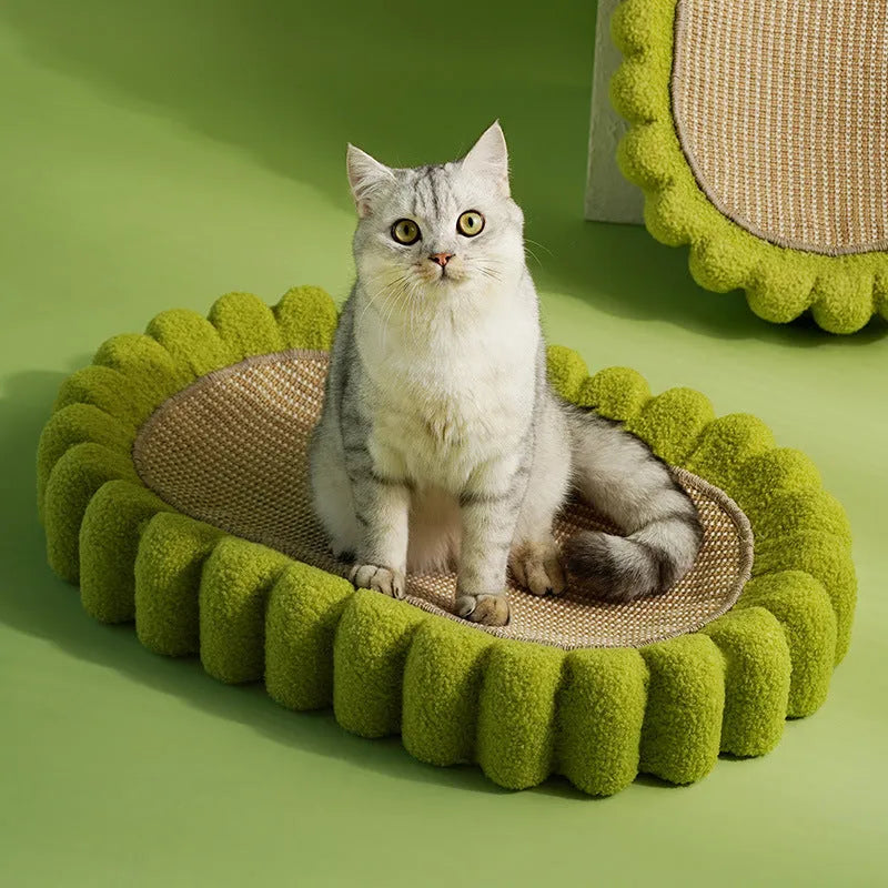 Green oval cat scratch pad bowl with sisal surface measuring 65cm