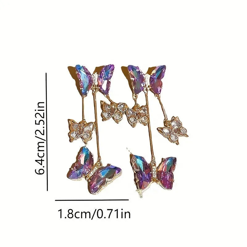 Silver Needle blue purple butterfly tassel earrings with crystal flowers on alloy chains, showing 7cm drop length.