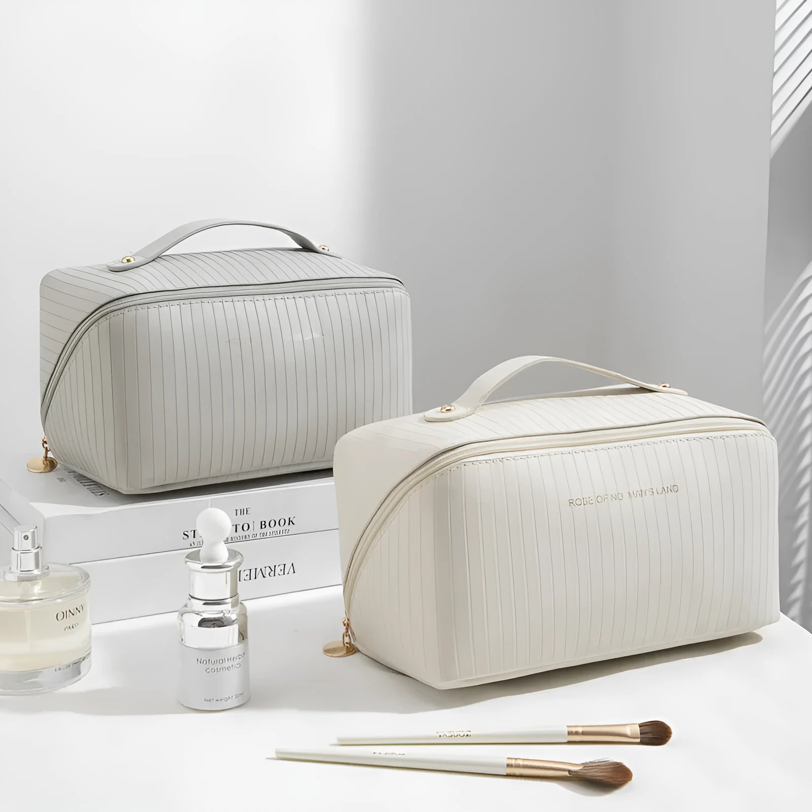 Large beige cubic PU leather makeup bag with vertical pattern, shown open.