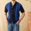 Short-sleeved striped polo shirt with a lapel collar in a light blue colour.