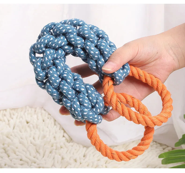 Blue braided cotton rope bone dog toy with double rings at each end for chewing and tooth cleaning