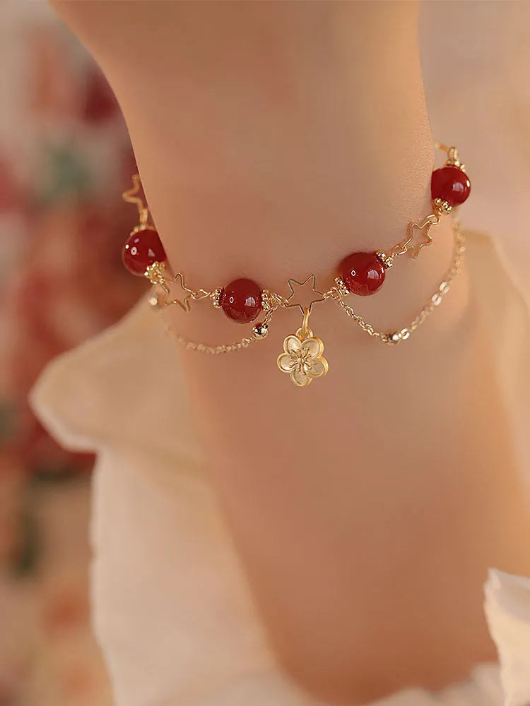 Women's red agate double layer bracelet with peach blossom design and manual processing