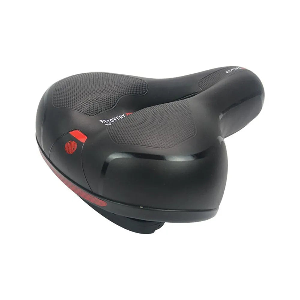 Soft silicone bicycle saddle cushion with black PU leather cover, shown with included waterproof cover, wrench, and puncture repair kit.