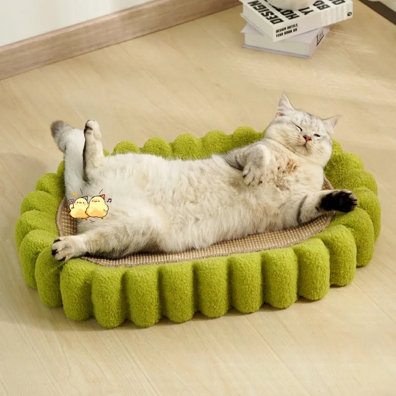 Green oval cat scratch pad bowl with sisal surface measuring 65cm