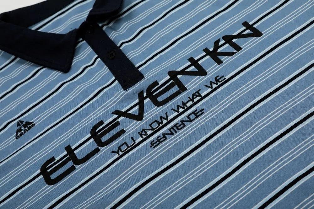 Blue vintage stripe loose-fit short-sleeved cotton polo shirt laid flat