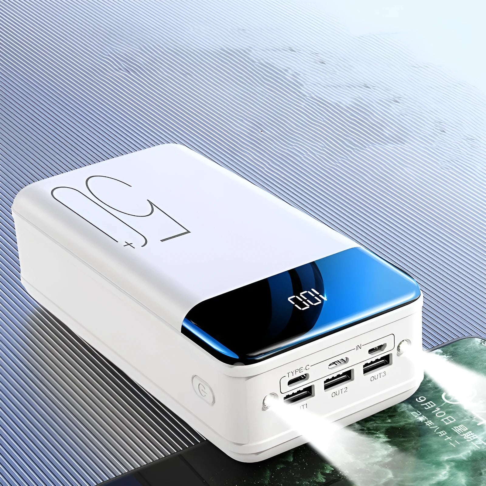 Black large capacity 50000mah portable power bank showing three output USB ports and three input charging ports on side