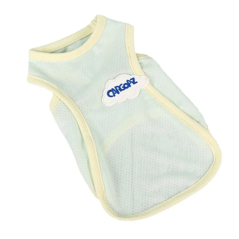 Grass green lightweight polyester vest for cats on a grey background, showing front hook-and-loop closure.