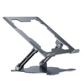 Grey portable aluminum laptop stand with adjustable angle, shown holding a silver laptop.