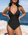 Solid colour one-piece swimsuit with triangle bikini top and cross-back shoulder straps