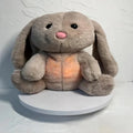 Breathing rabbit plush toy with moving belly, music functions, and soft fabrics for infant comfort