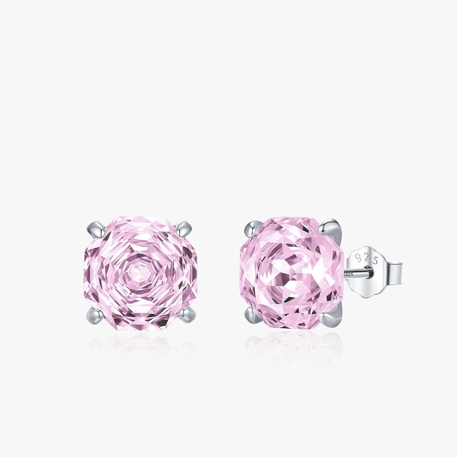 A pair of sterling silver stud earrings featuring a detailed rose flower design.