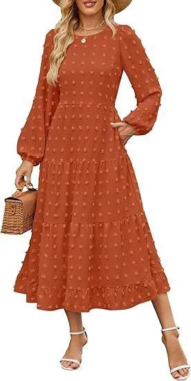 A beige high-waisted long sleeve dress with ruffled sleeves on a hanger.