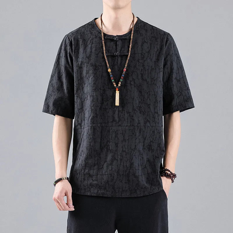 Men's round neck linen T-shirt with jacquard fastener decoration in a loose fit.