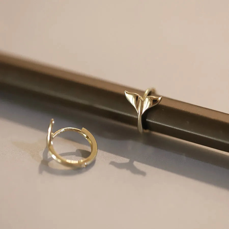 S925 sterling silver fishtail hoop earrings in gold and white gold finishes