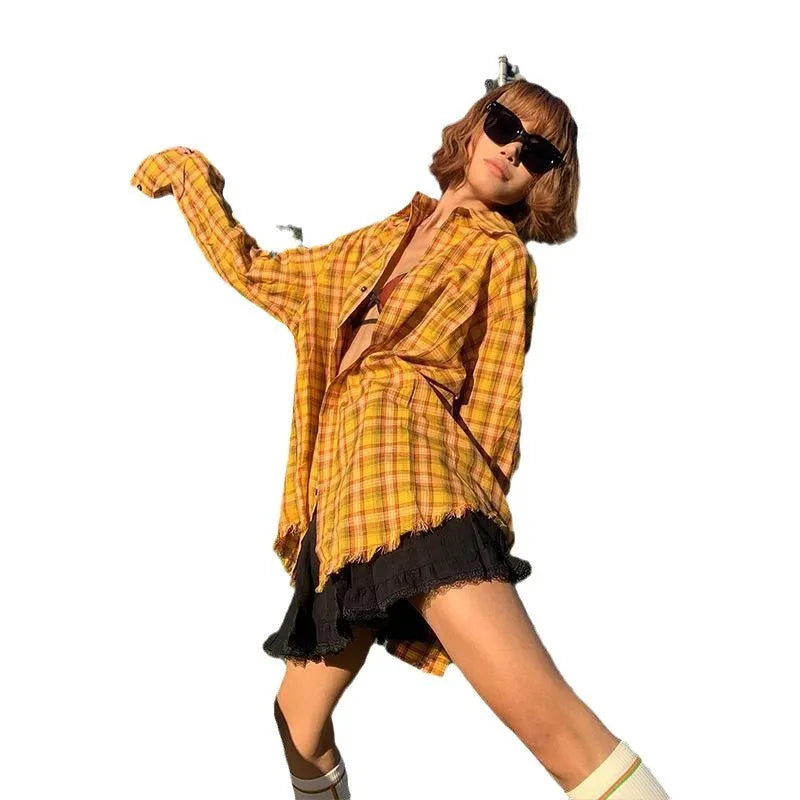 Yellow and white plaid shirt with a loose cardigan fit on a hanger.