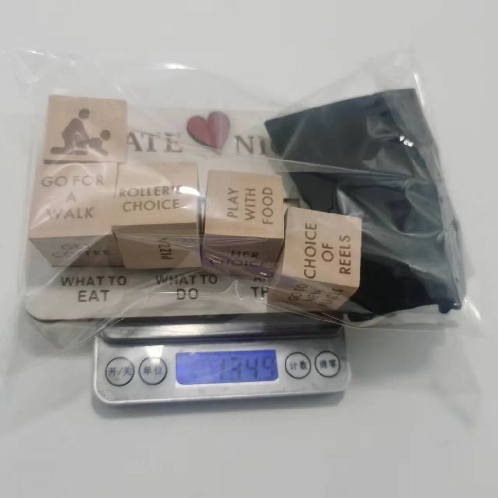 Wooden date night dice set showing five dice, planner board and black storage bag for couples