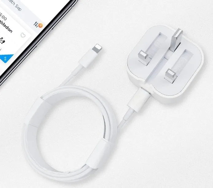 White 20W UK plug USB-C fast charger with a coiled Type-C charging cable.