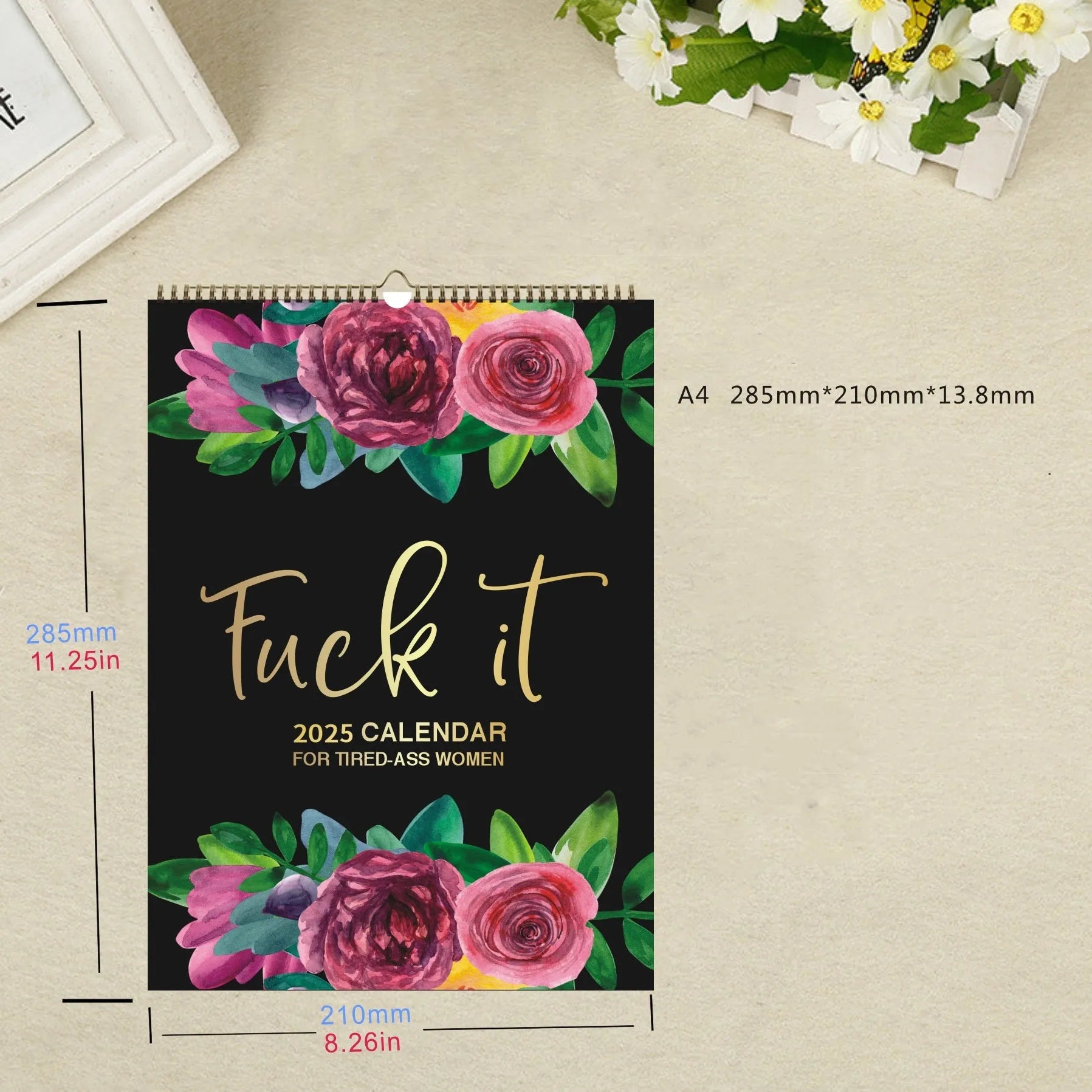 2024 wall calendar for tired women with coil binding showing monthly spread and funny sweary sayings
