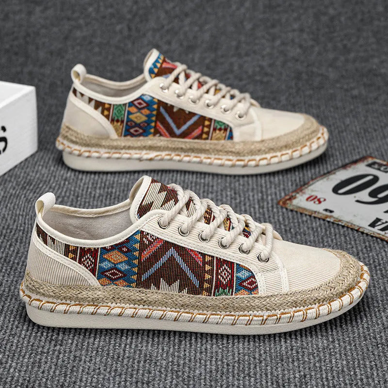 Men's beige and black cloth casual shoes with round toe and colour-block pattern, side view.