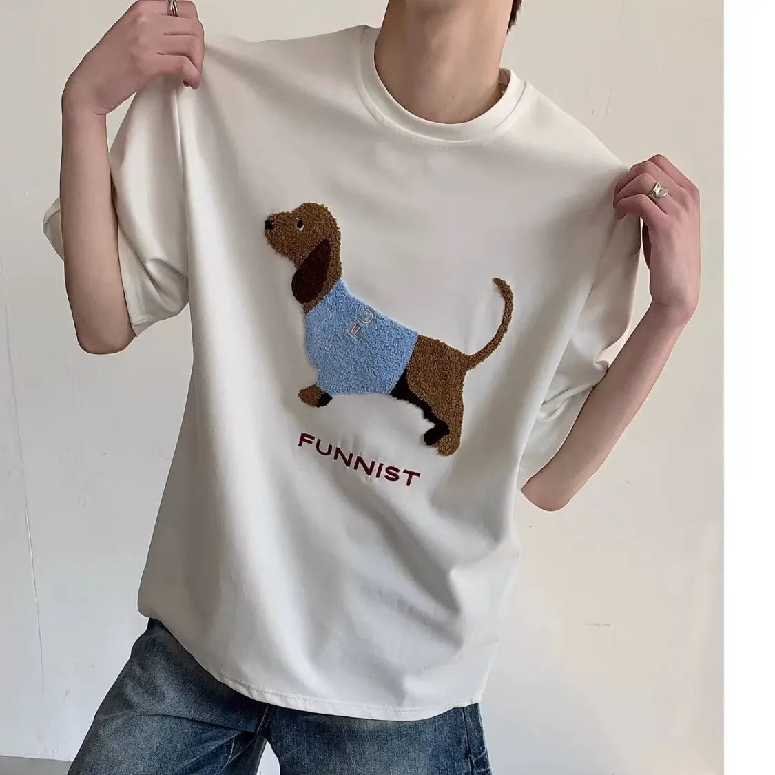 Men's grey cotton T-shirt with embroidered sausage dog wrapped in towel design