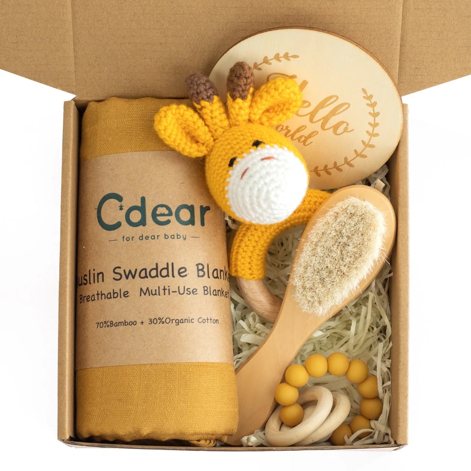 Baby teething toy gift set showing gauze blanket, wooden bell, gum teether, tire brush, and milestone on white background